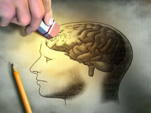 Άτομο σβήνει τμήμα ζωγραφισμένου εγκεφάλου