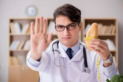 Γιατρός κρατά ψωμί και μεζούρα και λέει όχι-νευρολογικές παθήσεις