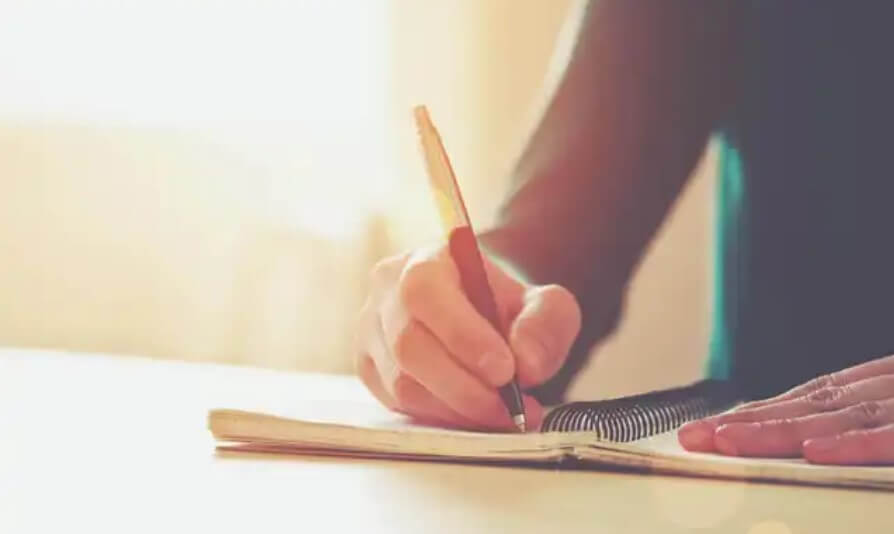 χέρι που γράφει